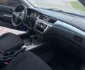 Синий Мицубиси Лансер, объемом двигателя 1.6 л и пробегом 145 тыс. км за 5500 $, фото 7 на Automoto.ua