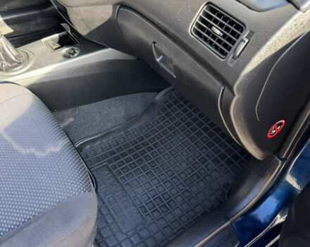 Синій Міцубісі Lancer, об'ємом двигуна 1.6 л та пробігом 148 тис. км за 3000 $, фото 19 на Automoto.ua