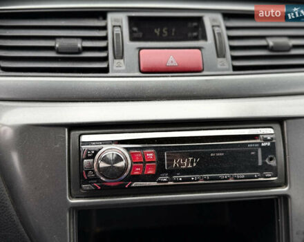 Синій Міцубісі Lancer, об'ємом двигуна 1.58 л та пробігом 513 тис. км за 2500 $, фото 21 на Automoto.ua