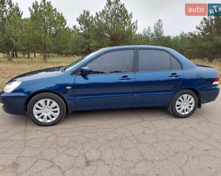 Синий Мицубиси Лансер, объемом двигателя 1.6 л и пробегом 222 тыс. км за 4599 $, фото 2 на Automoto.ua