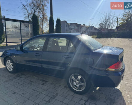 Синій Міцубісі Lancer, об'ємом двигуна 1.6 л та пробігом 148 тис. км за 3000 $, фото 5 на Automoto.ua