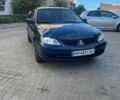 Синий Мицубиси Лансер, объемом двигателя 1.58 л и пробегом 214 тыс. км за 3800 $, фото 1 на Automoto.ua