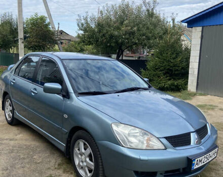 Мицубиси Лансер 2006 в Житомире на Automoto.ua Синий Мицубиси Лансер, объемом двигателя 1.58 л и пробегом 230 тыс. км за 4900 $, фото 2 на Automoto.ua