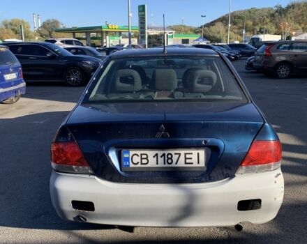 Синій Міцубісі Lancer, об'ємом двигуна 1.6 л та пробігом 242 тис. км за 2100 $, фото 4 на Automoto.ua