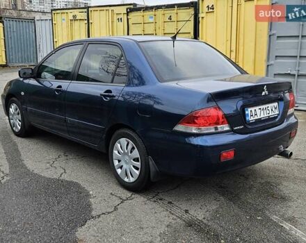 Синий Мицубиси Лансер, объемом двигателя 1.62 л и пробегом 114 тыс. км за 5200 $, фото 5 на Automoto.ua
