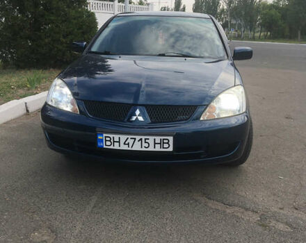 Синий Мицубиси Лансер, объемом двигателя 1.6 л и пробегом 169 тыс. км за 5100 $, фото 6 на Automoto.ua
