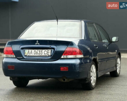 Синій Міцубісі Lancer, об'ємом двигуна 1.58 л та пробігом 513 тис. км за 2500 $, фото 15 на Automoto.ua