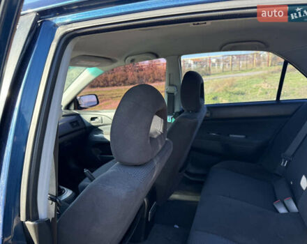 Синій Міцубісі Lancer, об'ємом двигуна 1.58 л та пробігом 269 тис. км за 3350 $, фото 18 на Automoto.ua