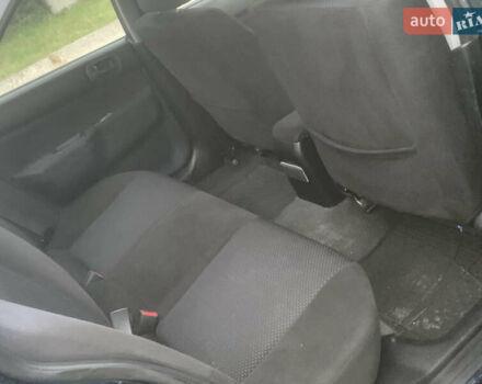 Мицубиси Лансер 2006 в Львове на Automoto.ua Синий Мицубиси Лансер, объемом двигателя 1.58 л и пробегом 420 тыс. км за 2900 $, фото 15 на Automoto.ua