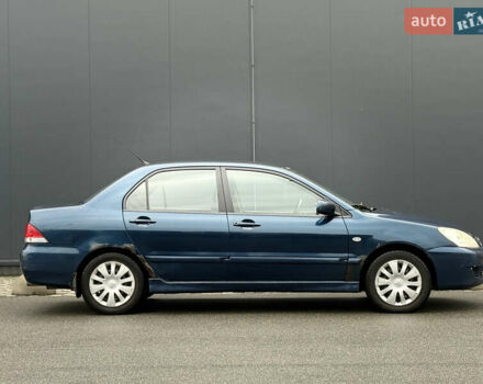 Синій Міцубісі Lancer, об'ємом двигуна 1.58 л та пробігом 513 тис. км за 2500 $, фото 12 на Automoto.ua