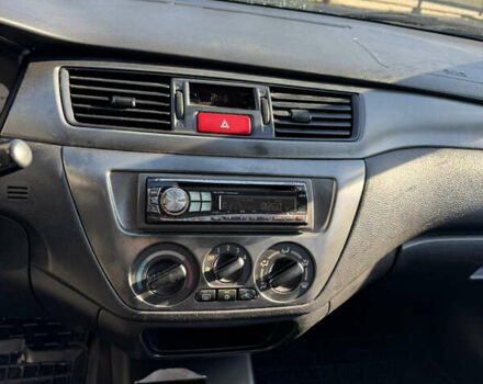 Синій Міцубісі Lancer, об'ємом двигуна 1.6 л та пробігом 148 тис. км за 3000 $, фото 12 на Automoto.ua