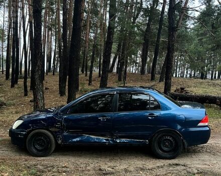 Синій Міцубісі Lancer, об'ємом двигуна 1.6 л та пробігом 210 тис. км за 3150 $, фото 5 на Automoto.ua