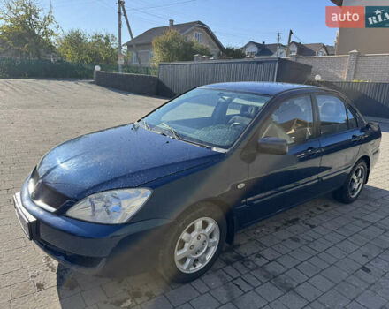 Синій Міцубісі Lancer, об'ємом двигуна 1.6 л та пробігом 148 тис. км за 3000 $, фото 1 на Automoto.ua