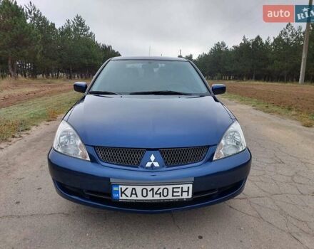 Синий Мицубиси Лансер, объемом двигателя 1.6 л и пробегом 222 тыс. км за 4599 $, фото 8 на Automoto.ua