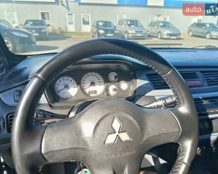 Синий Мицубиси Лансер, объемом двигателя 1.58 л и пробегом 274 тыс. км за 2650 $, фото 7 на Automoto.ua