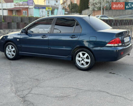 Синий Мицубиси Лансер, объемом двигателя 1.58 л и пробегом 300 тыс. км за 3650 $, фото 11 на Automoto.ua