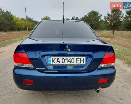 Синий Мицубиси Лансер, объемом двигателя 1.6 л и пробегом 222 тыс. км за 4599 $, фото 7 на Automoto.ua