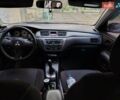 Синий Мицубиси Лансер, объемом двигателя 1.6 л и пробегом 360 тыс. км за 3000 $, фото 5 на Automoto.ua