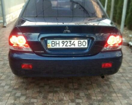 Синий Мицубиси Лансер, объемом двигателя 1.58 л и пробегом 195 тыс. км за 3990 $, фото 2 на Automoto.ua