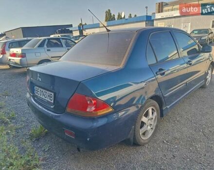 Синий Мицубиси Лансер, объемом двигателя 1.58 л и пробегом 274 тыс. км за 2650 $, фото 4 на Automoto.ua