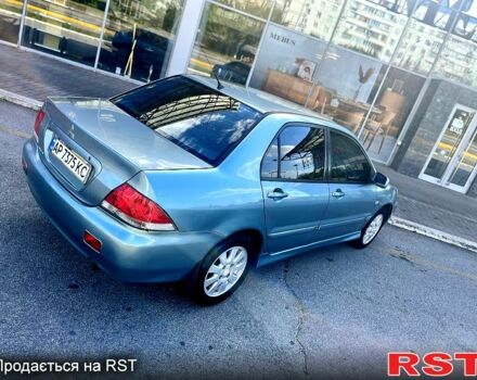 Синій Міцубісі Lancer, об'ємом двигуна 1.6 л та пробігом 273 тис. км за 3499 $, фото 3 на Automoto.ua