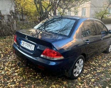 Синій Міцубісі Lancer, об'ємом двигуна 1.6 л та пробігом 380 тис. км за 3600 $, фото 2 на Automoto.ua