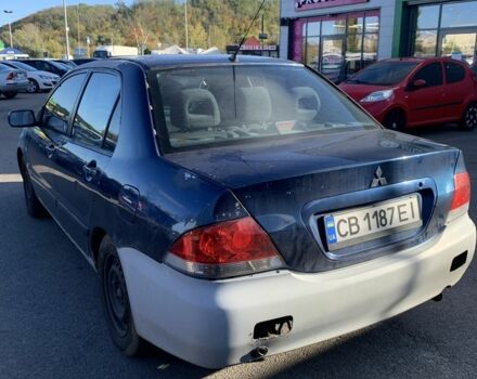 Синій Міцубісі Lancer, об'ємом двигуна 1.6 л та пробігом 242 тис. км за 2100 $, фото 5 на Automoto.ua