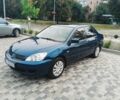 Синий Мицубиси Лансер, объемом двигателя 1.6 л и пробегом 180 тыс. км за 5500 $, фото 1 на Automoto.ua