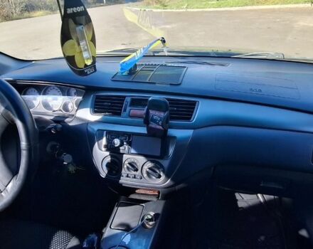 Синій Міцубісі Lancer, об'ємом двигуна 1.6 л та пробігом 267 тис. км за 3700 $, фото 8 на Automoto.ua