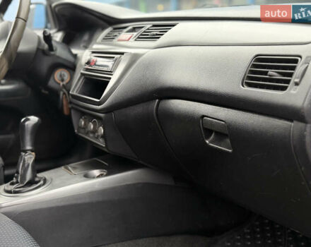 Синій Міцубісі Lancer, об'ємом двигуна 1.58 л та пробігом 513 тис. км за 2500 $, фото 23 на Automoto.ua