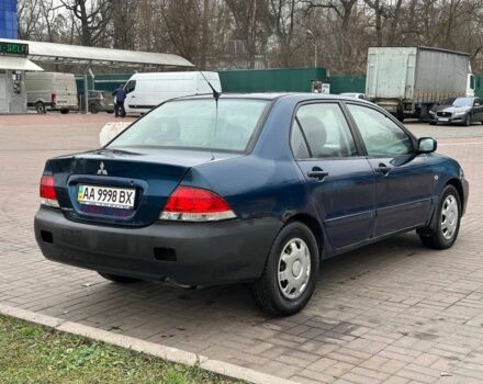 Синий Мицубиси Лансер, объемом двигателя 1.6 л и пробегом 260 тыс. км за 2300 $, фото 3 на Automoto.ua