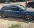 Синий Мицубиси Лансер, объемом двигателя 1.6 л и пробегом 163 тыс. км за 3300 $, фото 1 на Automoto.ua