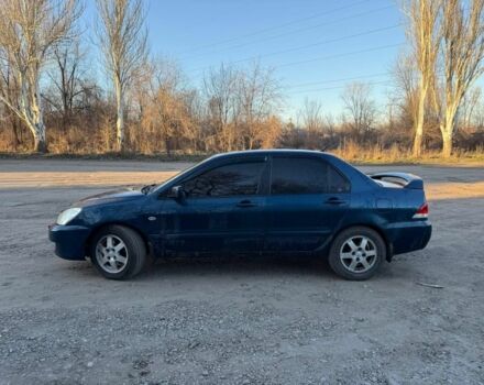 Синий Мицубиси Лансер, объемом двигателя 1.6 л и пробегом 330 тыс. км за 3999 $, фото 1 на Automoto.ua