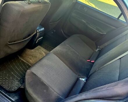 Синій Міцубісі Lancer, об'ємом двигуна 1.6 л та пробігом 273 тис. км за 3499 $, фото 5 на Automoto.ua