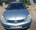Синій Міцубісі Lancer, об'ємом двигуна 1.58 л та пробігом 242 тис. км за 3900 $, фото 1 на Automoto.ua