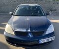 Синій Міцубісі Lancer, об'ємом двигуна 1.6 л та пробігом 242 тис. км за 2100 $, фото 2 на Automoto.ua