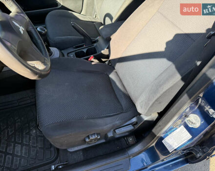 Синій Міцубісі Lancer, об'ємом двигуна 1.58 л та пробігом 269 тис. км за 3350 $, фото 11 на Automoto.ua