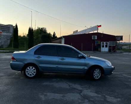 Синій Міцубісі Lancer, об'ємом двигуна 1.6 л та пробігом 237 тис. км за 4099 $, фото 2 на Automoto.ua