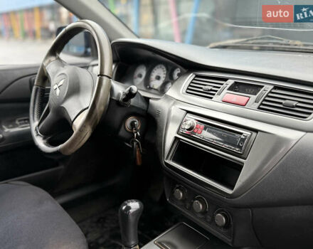 Синій Міцубісі Lancer, об'ємом двигуна 1.58 л та пробігом 513 тис. км за 2500 $, фото 22 на Automoto.ua