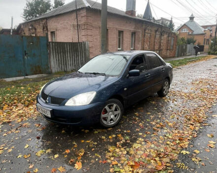 Синий Мицубиси Лансер, объемом двигателя 1.58 л и пробегом 179 тыс. км за 3800 $, фото 1 на Automoto.ua