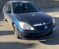 Синій Міцубісі Lancer, об'ємом двигуна 1.6 л та пробігом 242 тис. км за 2100 $, фото 1 на Automoto.ua