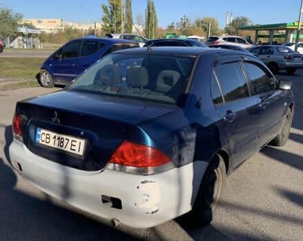 Синій Міцубісі Lancer, об'ємом двигуна 1.6 л та пробігом 242 тис. км за 2100 $, фото 3 на Automoto.ua