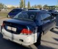 Синій Міцубісі Lancer, об'ємом двигуна 1.6 л та пробігом 242 тис. км за 2100 $, фото 3 на Automoto.ua