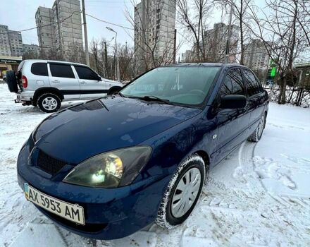 Синій Міцубісі Lancer, об'ємом двигуна 1.6 л та пробігом 185 тис. км за 4575 $, фото 5 на Automoto.ua