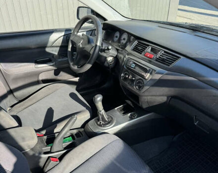Синій Міцубісі Lancer, об'ємом двигуна 1.6 л та пробігом 148 тис. км за 3000 $, фото 18 на Automoto.ua