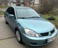 Синий Мицубиси Лансер, объемом двигателя 1.6 л и пробегом 235 тыс. км за 4499 $, фото 1 на Automoto.ua
