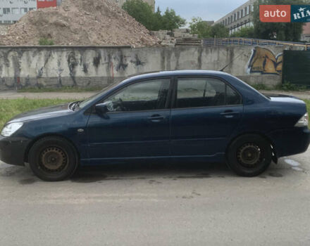 Мицубиси Лансер 2006 в Львове на Automoto.ua Синий Мицубиси Лансер, объемом двигателя 1.58 л и пробегом 420 тыс. км за 2900 $, фото 4 на Automoto.ua