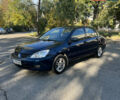 Міцубісі Lancer 2006 у Дніпро (Дніпропетровську) на Automoto.ua Синій Міцубісі Lancer, об'ємом двигуна 1.58 л та пробігом 284 тис. км за 4500 $, фото 5 на Automoto.ua