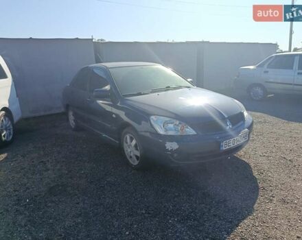 Синий Мицубиси Лансер, объемом двигателя 1.58 л и пробегом 274 тыс. км за 2650 $, фото 1 на Automoto.ua