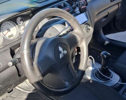 Синій Міцубісі Lancer, об'ємом двигуна 1.6 л та пробігом 267 тис. км за 3700 $, фото 13 на Automoto.ua